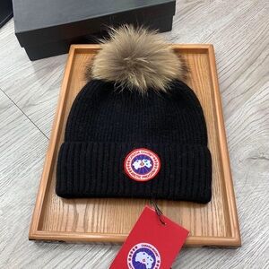 Canada Goose Black Knit Hat with Brown Pom